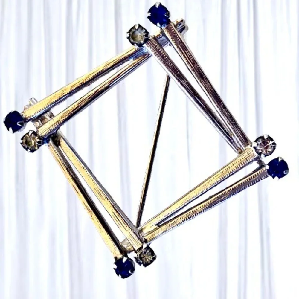 LU brooch 12k